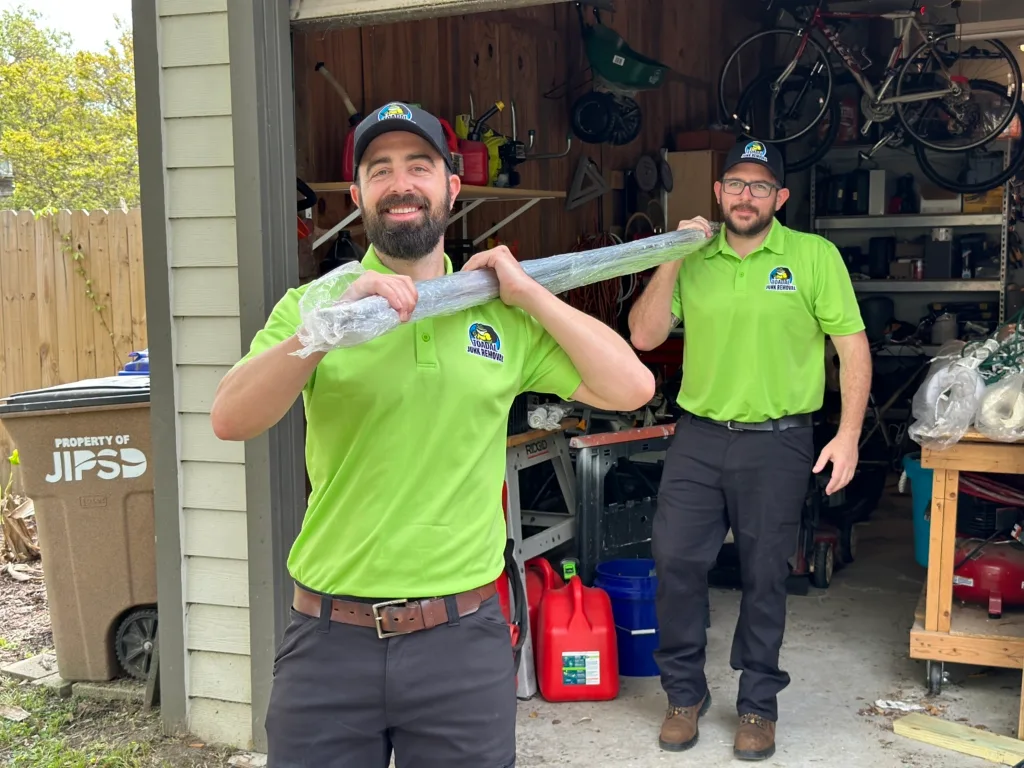 Toadal Junk Removal experts hauling junk away